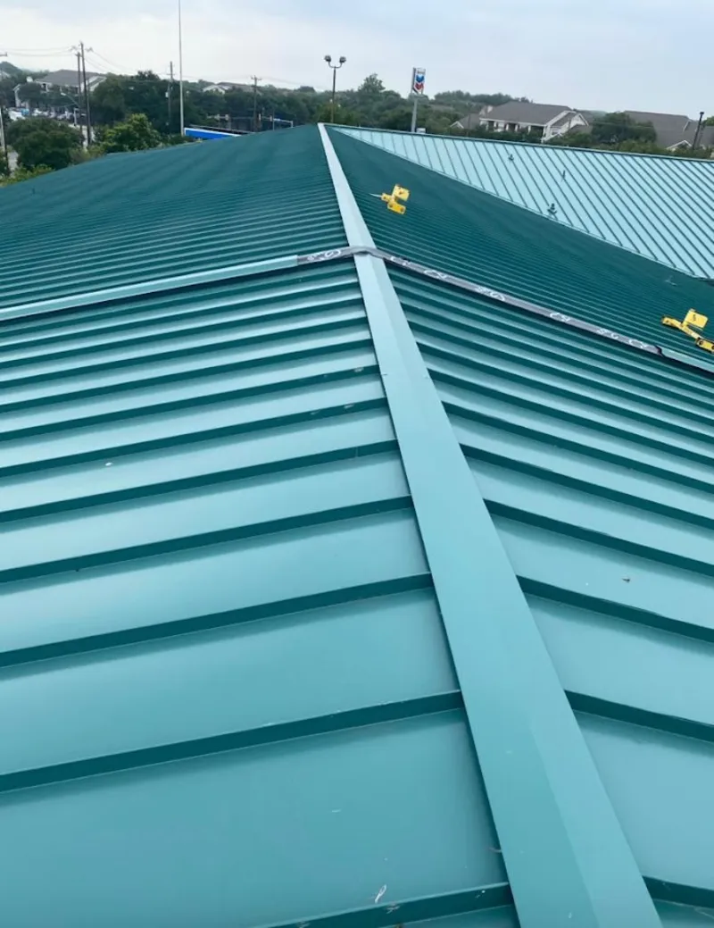Green commercial metal roof ridge and valley for Metal Roof Repair in Fernandina Beach